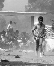 © Max Stahl / CAMSTL (Centro Audiovisual Max Stahl Timor Leste) Demonstrators run from bullets